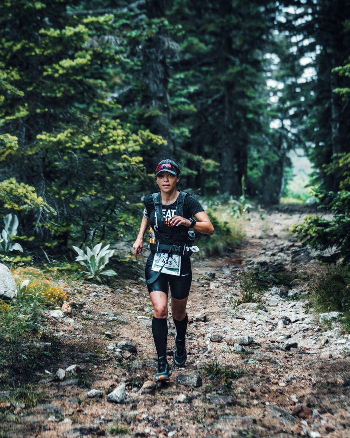 About Woman running on a rocky forest path in Bursa, Turkey, showcasing determination and fitness.